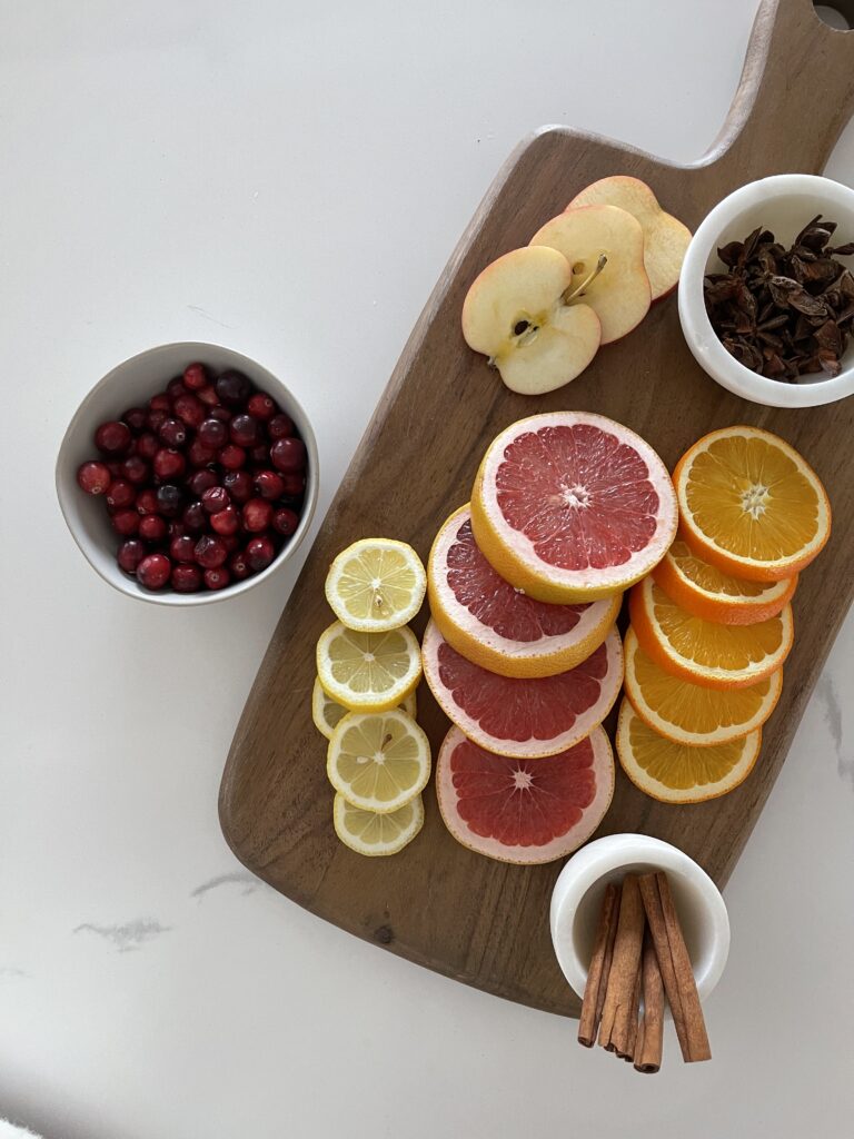 Festive Halloween Charcuterie, sliced citrus, Fall