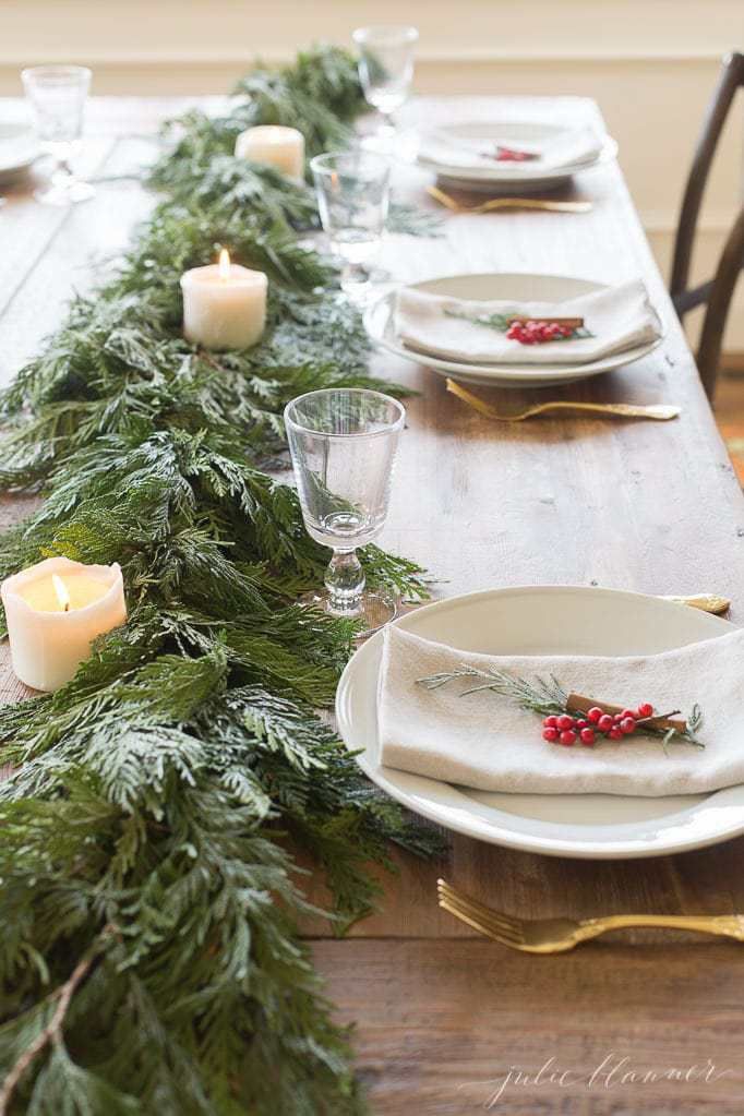 How to set a dining room table, garland, dinnerware, holiday center-piece 